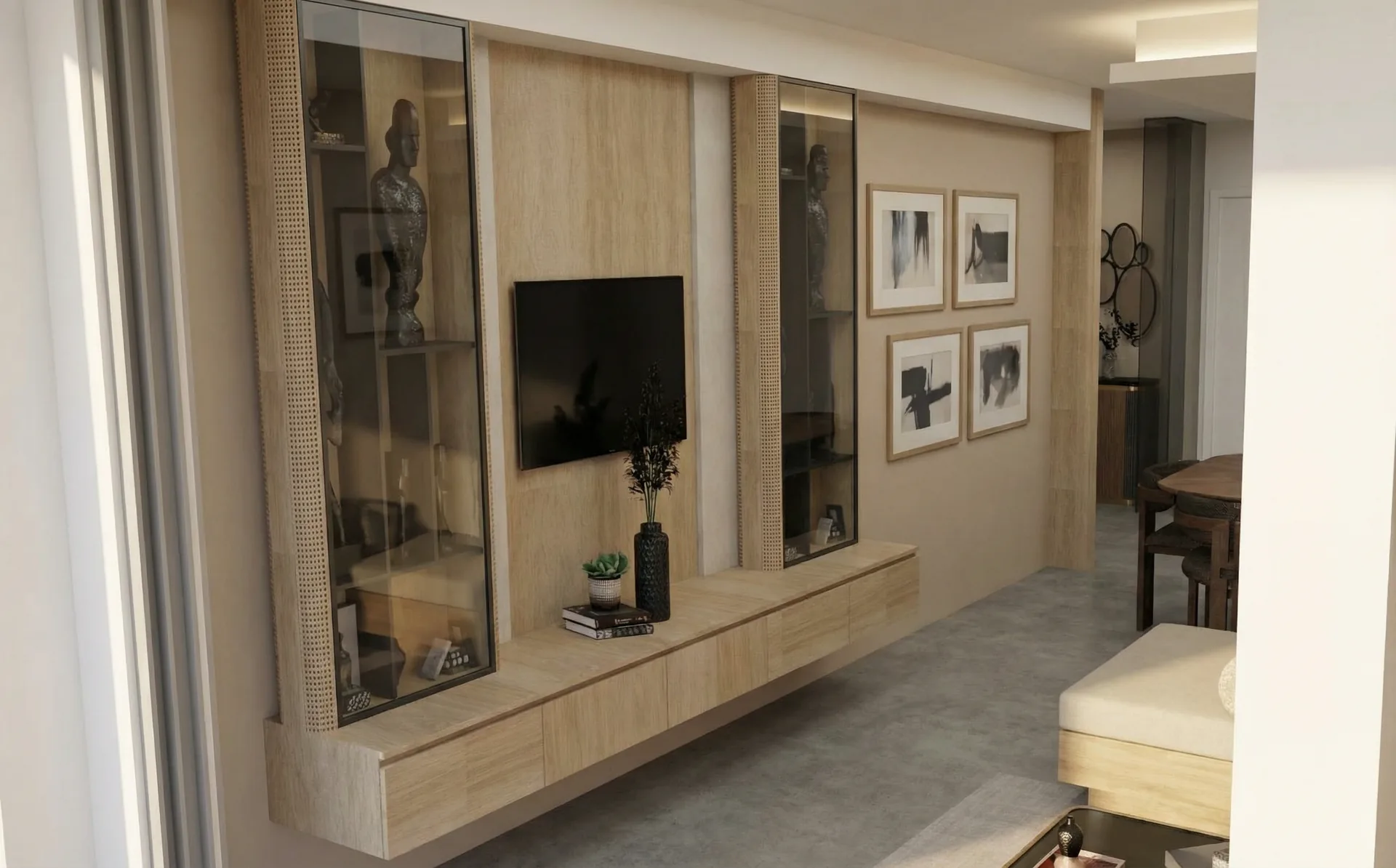 Meuble TV sur mesure avec vitrines en cannage dans le séjour d'un T3 à Antibes
